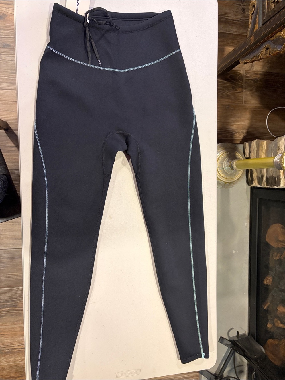 Lemorecn swim/wetsuit NWT bottoms black with contrast mint color stitching.